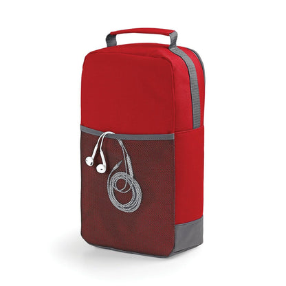A red and gray bag with a mesh pocket and a pair of white earbuds hanging from the pocket.